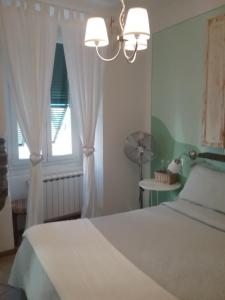 Кровать или кровати в номере La Gioia