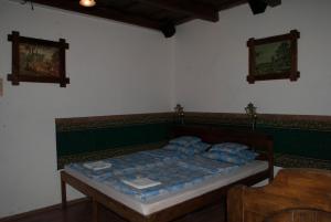 เตียงในห้องที่ Szent Péter vendégház