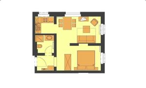 a floor plan of a house with furniture at Villa Maria Wohnung 08 in Ostseebad Koserow