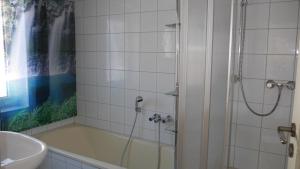 Koupelna v ubytování Nähe Spieleland + 2 fotografie