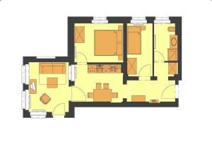 a floor plan of a house with furniture at Villa Maria Wohnung 01 in Ostseebad Koserow