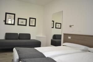 Posteľ alebo postele v izbe v ubytovaní Casa vacanze da Alcide