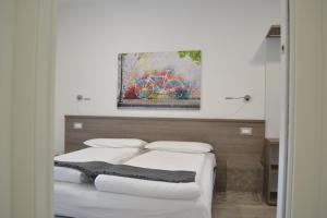 Posteľ alebo postele v izbe v ubytovaní Casa vacanze da Alcide
