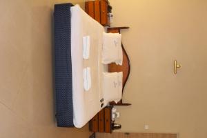 Katil atau katil-katil dalam bilik di Hotel Pooja International
