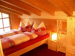 Ein Bett oder Betten in einem Zimmer der Unterkunft Landhaus Panorama