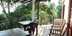 En balkon eller terrasse på Okeed Ella
