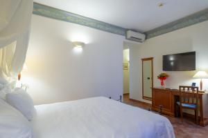 Кровать или кровати в номере Hotel Davanzati