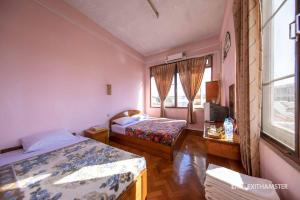 Ένα ή περισσότερα κρεβάτια σε δωμάτιο στο Gypsy Inn