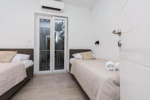 Postel nebo postele na pokoji v ubytování Jagger House