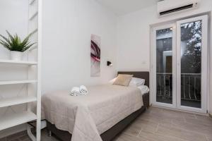 Postel nebo postele na pokoji v ubytování Jagger House