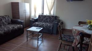 Istumisnurk majutusasutuses Apartamento Golden Junior