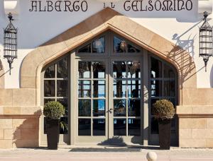 an entrance to a store with a large glass door at Albergo Gelsomino in Kos Town