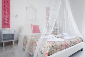 Letto o letti in una camera di Cubaneros Holiday Inn
