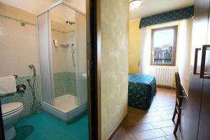 Ванна кімната в Albergo Dei Leoni