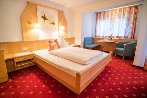 Letto o letti in una camera di Haus Markus