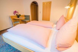 Letto o letti in una camera di Haus Markus