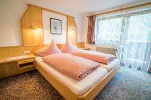 Letto o letti in una camera di Haus Markus