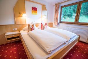 Letto o letti in una camera di Haus Markus