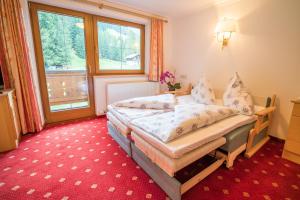 Letto o letti in una camera di Haus Markus