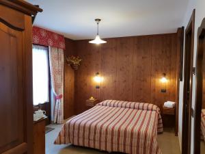 Postel nebo postele na pokoji v ubytování Affittacamere Verger Plein Soleil