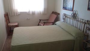 Postel nebo postele na pokoji v ubytování Apartamento Venecia