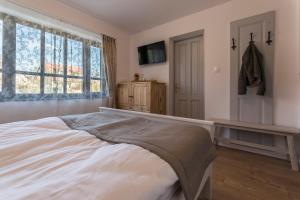 A bed or beds in a room at Villa Lenka