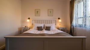 A bed or beds in a room at Villa Lenka
