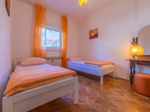 Postel nebo postele na pokoji v ubytování House Barbara