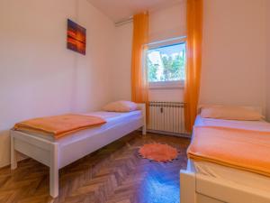 Postel nebo postele na pokoji v ubytování House Barbara