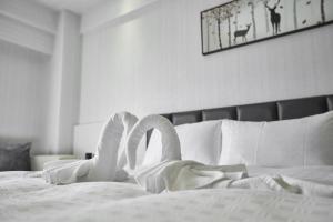 Voodi või voodid majutusasutuse Fulidun Hotel Kenting toas