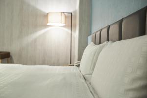 Voodi või voodid majutusasutuse Fulidun Hotel Kenting toas