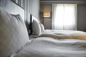 Voodi või voodid majutusasutuse Fulidun Hotel Kenting toas