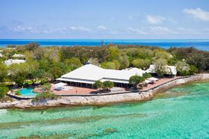 an aerial view of a resort in the water at Heron Island in Heron Island