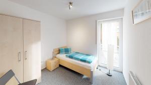 Voodi või voodid majutusasutuse Apartmenthaus Gärtner toas