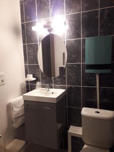 Koupelna v ubytování Hotel Le Beauregard