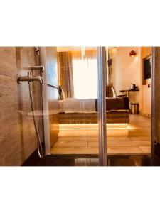 Postel nebo postele na pokoji v ubytování JRD Pride-Business Hotel