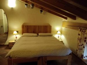 Postel nebo postele na pokoji v ubytování Affittacamere I Picchi