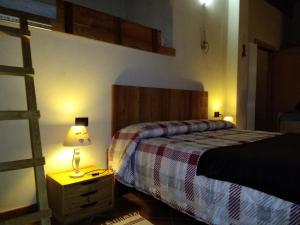 Postel nebo postele na pokoji v ubytování Affittacamere I Picchi
