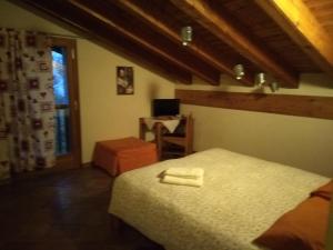 Postel nebo postele na pokoji v ubytování Affittacamere I Picchi
