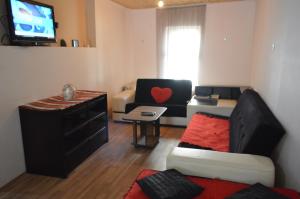 Et opholdsområde på Lomari's Guest House