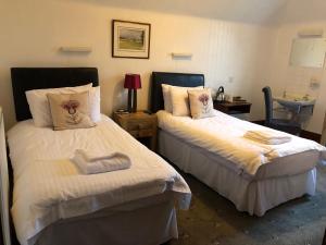 Postel nebo postele na pokoji v ubytování Westerlea Hotel Nairn