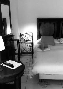 Palazzo Morese Apartmentsにあるベッド
