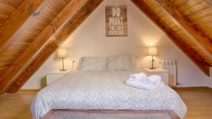 Posteľ alebo postele v izbe v ubytovaní Saplan Real Estate MONTLUDE