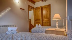 Posteľ alebo postele v izbe v ubytovaní Saplan Real Estate MONTLUDE