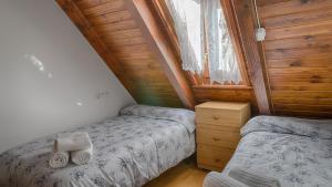 Posteľ alebo postele v izbe v ubytovaní Saplan Real Estate MONTLUDE