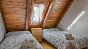 Posteľ alebo postele v izbe v ubytovaní Saplan Real Estate MONTLUDE