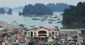 an aerial view of a harbor with boats in the water at Ha Long DC Hotel in Ha Long