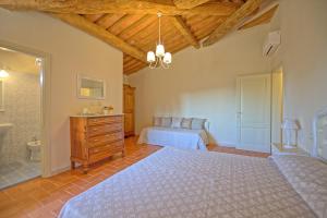 Posteľ alebo postele v izbe v ubytovaní Villa Bonriposo by PosarelliVillas + 35 fotografií
