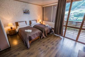 Кровать или кровати в номере Hotel Banguriani