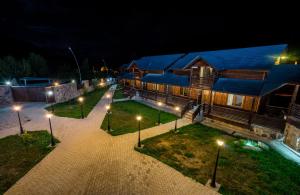 an aerial view of a house at night at Hotel Banguriani in Mestia